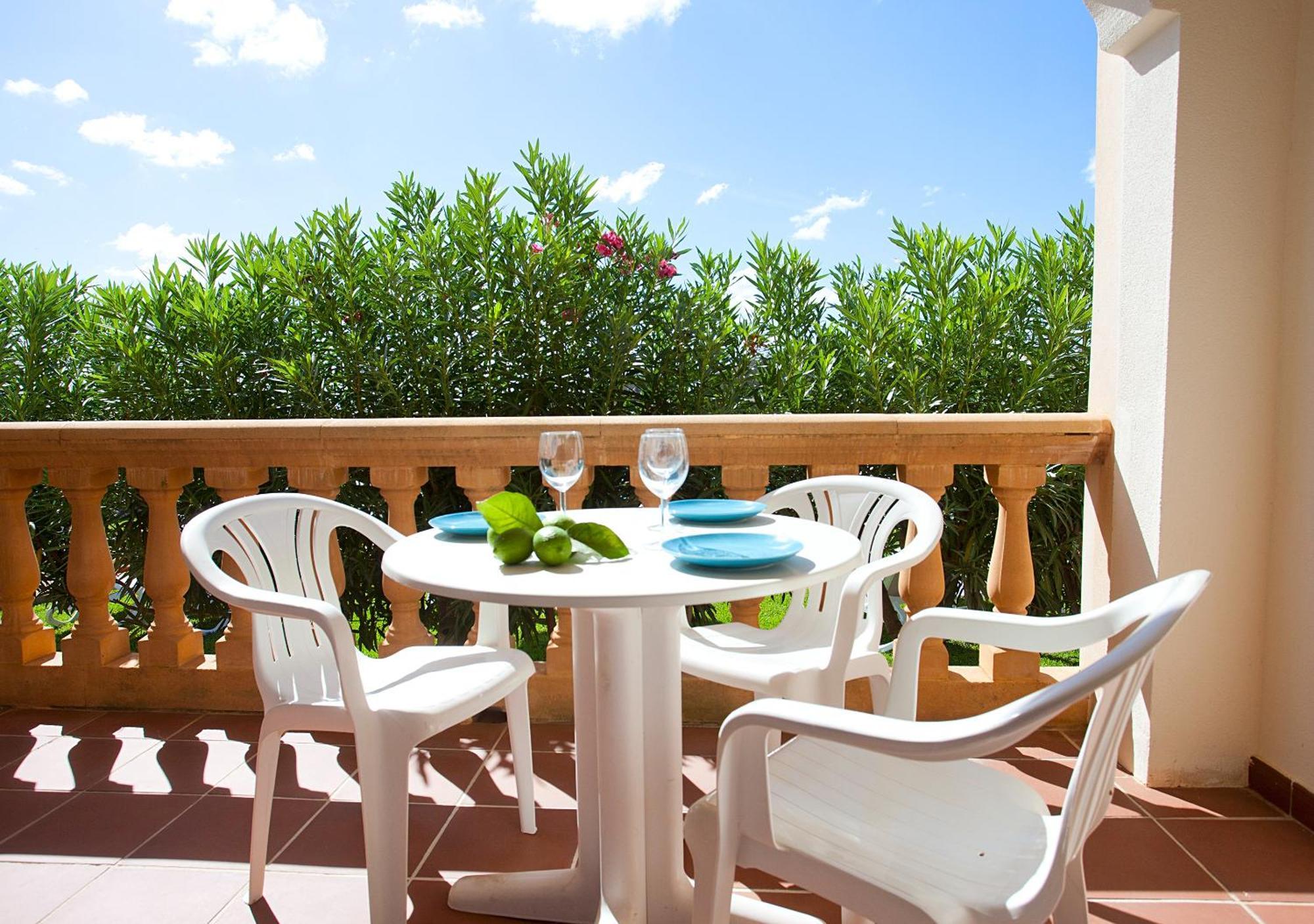 Apartamentos Sol Romántica by DOT Suites Cala Romàntica Habitación foto