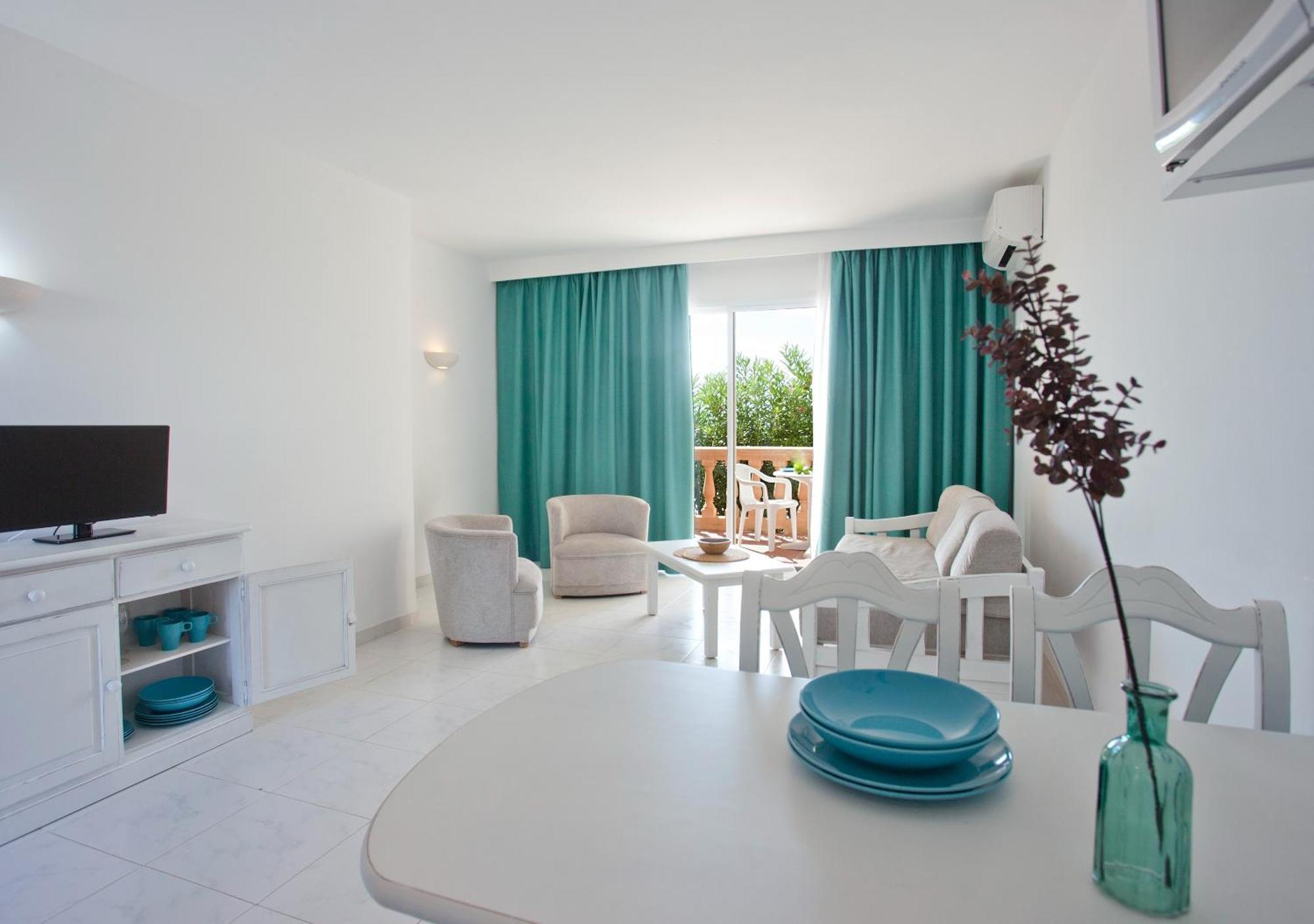 Apartamentos Sol Romántica by DOT Suites Cala Romàntica Habitación foto