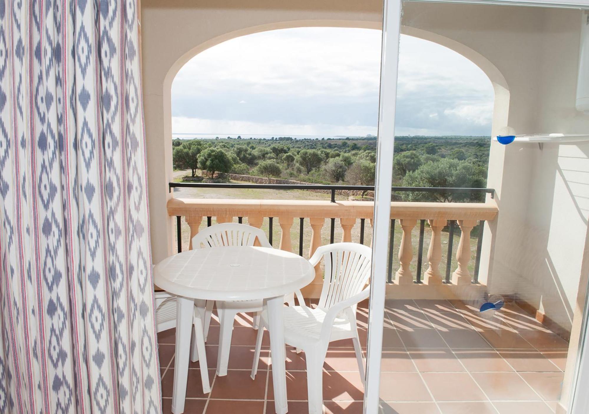 Apartamentos Sol Romántica by DOT Suites Cala Romàntica Habitación foto